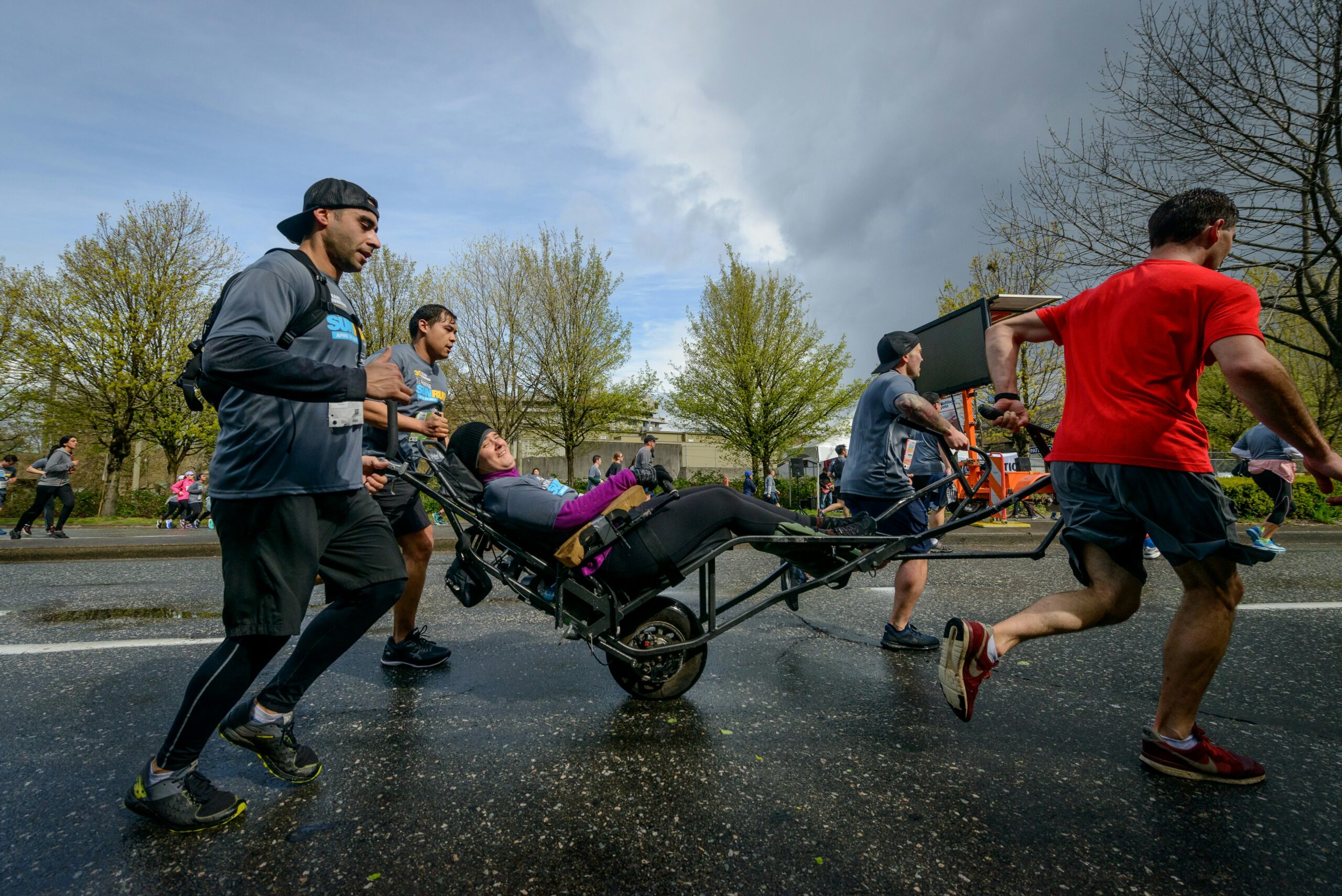 people running and rolling in a walk-a-thin fundraiser